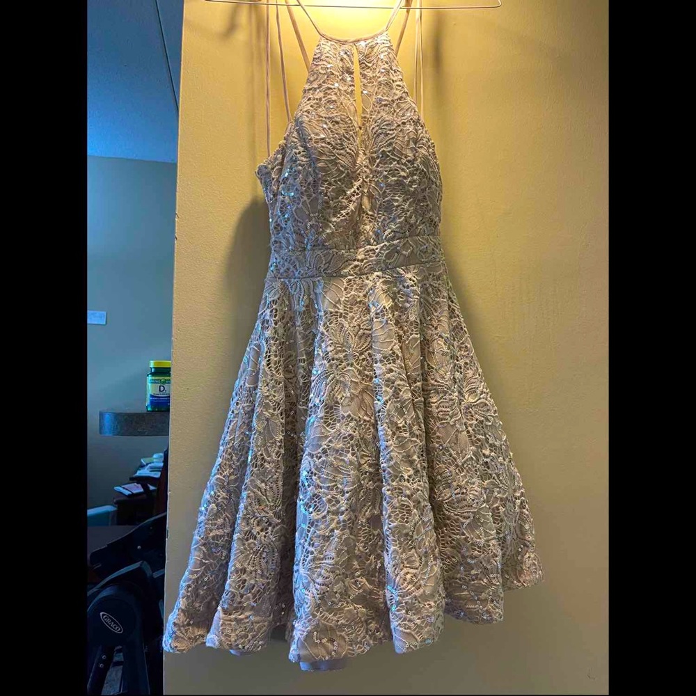 It was birthday dress. Just worn once. It’s from Macy’s B. Darlin prom dress.